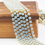 3.2 mm rhinestone chain with Light Sapphire Opal Preciosa crystals in raw setting x 40 cm