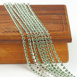 2.4 mm rhinestone chain with Erinite Preciosa crystals in silver setting x 40 cm