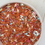 Miyuki Quarter Tila beads nr.4576 Crystal Orange Rainbow x 5 g