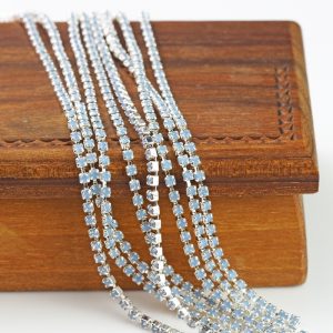 2.1 mm rhinestone chain with Light Sapphire Opal Preciosa crystals in silver setting x 20 cm