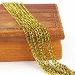 2.1 mm rhinestone chain with Olivine Preciosa crystals in raw setting x 20 cm