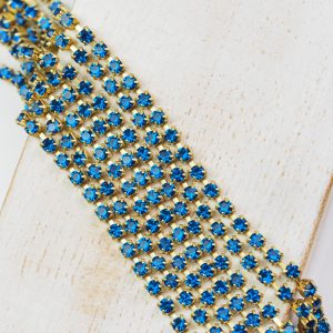 2.4 mm rhinestone chain with Capri Blue Preciosa crystals in raw setting x 20 cm