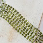 2.4 mm rhinestone chain with Olivine Preciosa crystals in silver setting x 20 cm