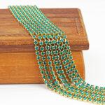 3.2 mm rhinestone chain with Blue Zircon Preciosa crystals in raw setting x 40 cm