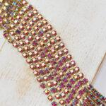 2.5 mm rhinestone chain with Fuchsia AB Preciosa crystals in raw setting x 20 cm