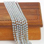 3.2 mm rhinestone chain with Light Sapphire Opal Preciosa crystals in silver setting x 40 cm