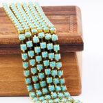 3.2 mm rhinestone chain with Turquoise Preciosa crystals in raw setting x 20 cm