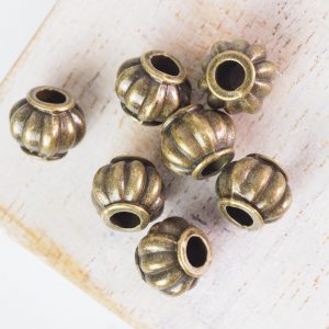 9.5x7.5 mm metal bead bronze x 10 pc(s)