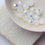 6 mm Preciosa faceted round beads White Opal AB x 15 pc(s)