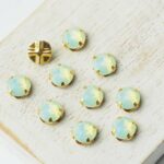 6 mm / ss30 Preciosa sew-on rhinestone Chrysolite Opal in Gold-colored setting x 10 pc(s)