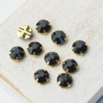 6 mm / ss30 Preciosa sew-on rhinestone Jet in Gold-colored setting x 10 pc(s)