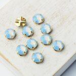 6 mm / ss30 Preciosa sew-on rhinestone Light Sapphire Opal in Gold-colored setting x 10 pc(s)