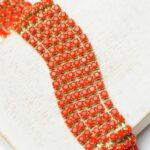 2.4 mm rhinestone chain with Red Opaque in raw setting x 40 cm