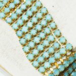 4.2 mm rhinestone chain with Aqua Opal in raw setting x 40 cm
