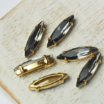 4x15 mm navette glass cabochon Black Diamond with gold-colored claw x 6 pc(s)