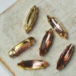 4x15 mm navette glass cabochon Light Padparadscha with gold-colored claw x 6 pc(s)