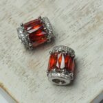 9x11 mm Silver-colored Fancy Metal bead with Zircons Light Siam x 1 pc(s)"