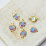 6 mm / ss29 Preciosa connector Crystal AB in Gold-colored setting x 6 pc(s)