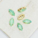 5x10 mm Navette glass cabochon Pacific Opal with gold-colored claw x 6 pc(s)