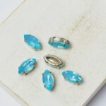 5x10 mm Navette glass cabochon Light Opal with silver-colored claw x 6 pc(s)