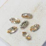 5x10 mm Navette glass cabochon Golden Shadow with silver-colored claw x 6 pc(s)