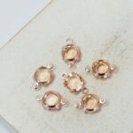6 mm / ss29 Preciosa connector Light Peach in Rose Gold-colored setting x 6 pc(s)