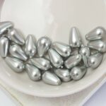6x10 mm Preciosa Nacre pear pearls Light Grey x 10 pc(s)