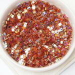 Miyuki Half Tila 257 Transparent Topaz AB x 5 g