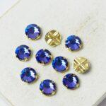 6 mm / ss30 Preciosa sew-on rhinestone Crystal Heliotrope in Gold-colored setting x 10 pc(s)