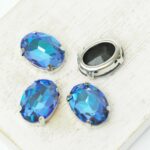 10x14 mm oval glass cabochon Olivine Shine with silver-colored claw x 4 pc(s)