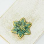 24x27 mm Small Star Beadingschool Art cabochon Sissi Green on light clay x 1 pc(s)