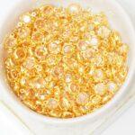 6 mm / ss29 Preciosa connector Light Peach in Gold-colored setting x 6 pc(s)