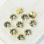 6 mm / ss29 Preciosa Chaton Montee Black Diamond in Gold-colored setting x 10 pc(s)