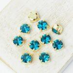6 mm / ss29 Preciosa Chaton Montee Indicolite in Gold-colored setting x 10 pc(s)