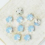 6 mm / ss29 Preciosa Chaton Montee Light Sapphire Opal in Silver-colored setting x 10 pc(s)