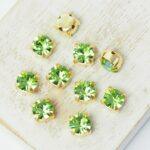 6 mm / ss29 Preciosa Chaton Montee Peridot in Gold-colored setting x 10 pc(s)