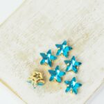 8 mm star glass cabochon Aquamarine with gold-colored claw x 6 pc(s)