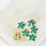 8 mm star glass cabochon Emerald with gold-colored claw x 6 pc(s)