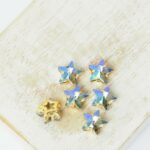8 mm star glass cabochon Ghost Light with gold-colored claw x 6 pc(s)