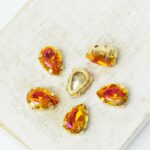 7x10 mm drop glass cabochon Copper with gold-colored claw x 6 pc(s)