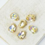 7x10 mm drop glass cabochon Paradise Shine with gold-colored claw x 6 pc(s)