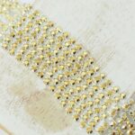 2.4 mm rhinestone chain with Crystal Aurum in silver setting x 40 cm
