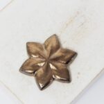 24x27 mm Small Star Beadingschool Art Cabochon Patina Bronze on light clay x 1 pc(s)
