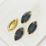 7x15 mm navette glass cabochon Black Diamond Matt with gold-colored claw x 4 pc(s)