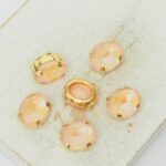 8x10 mm oval glass cabochon Juicy Peach Shine with gold-colored claw x 6 pc(s)