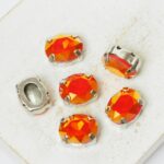 8x10 mm oval glass cabochon Astral Pink Opal with silver-colored claw x 6 pc(s)