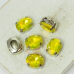 8x10 mm oval glass cabochon Lime Opal AB with silver-colored claw x 6 pc(s)