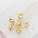 4x6 mm Preciosa Fancy Baroque Pear Jonquil with Gold-colored claw x 6 pc(s)