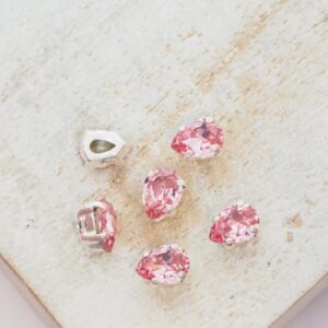 4x6 mm Preciosa Fancy Baroque Pear Light Rose with Silver-colored claw x 6 pc(s)