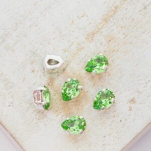4x6 mm Preciosa Fancy Baroque Pear Peridot with Silver-colored claw x 6 pc(s)